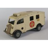 A Triang Minic Clockwork 75M Ambulance with working motor.