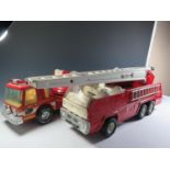 Two Large Scale Fire Engines, One Tonka and One Nylint.