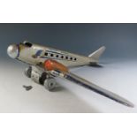 A Scarce Mettoy Clockwork Tinplate Airliner Series, circa 1935 (52cm approx wingspan). DC3
