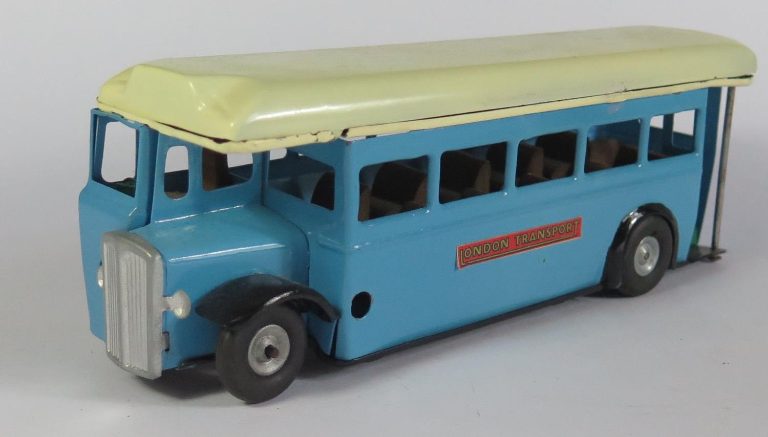 A Triang Minic Clockwork 52M Single Deck Bus in blue and cream with working motor (repainted).