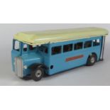 A Triang Minic Clockwork 52M Single Deck Bus in blue and cream with working motor (repainted).