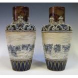 A Pair of Hannah Barlow Doulton Burslem Vases decorated with cattle, incised initials to base 27.5cm