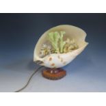 A Seashell Lamp with coral decoration, 27cm long