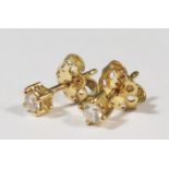 A Pair of Modern 18ct Gold and Diamond Stud Earrings, 1.5g, EDW .12ct