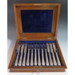 A Victorian Walnut Canteen of Twelve Knives and Forks, Sheffield 1863, Martin, Hall & Co.