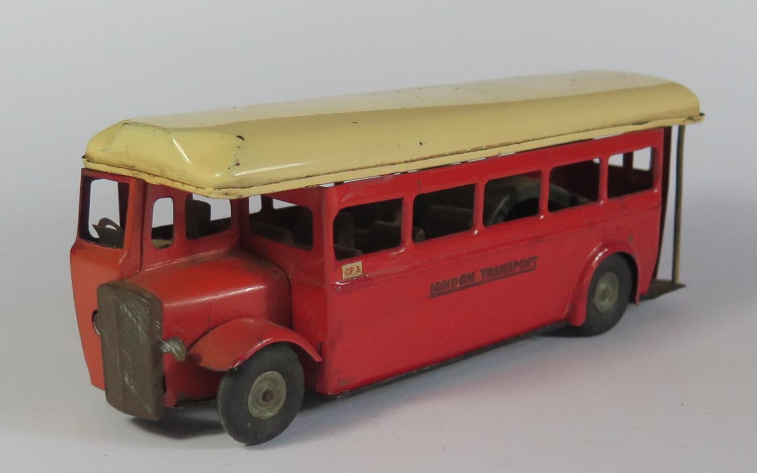 Triang Minic "Push 'n Go" Single Deck Bus in red/cream.