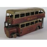 An Early Triang Minic Clockwork 60M Double Deck Bus in maroon and grey (not working, missing motor