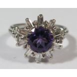 An 18ct White Gold, Amethyst and Baguette Cut Diamond Dress Ring, size L, 6.2g, head of ring 17mm,