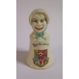 A Carmen China Suffragette 'Votes for women' Crested Ware SEASCALE Bell, the finial with an 'ugly'