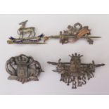A Silver ROYAL WARWICKSHIRE Brooch and three others