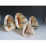 A Collection of Four Maritime Painted Conch Shells including M.S. Maron and Bunmuir etc., largest