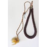 A 1930's Indian Garnet bead Necklace, 59cm to knot