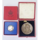A Queen Victoria 1837-1897 Copper Commemorative medal in a gilt Morocco case and one other