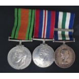 A WWII Medal Pair Navy Long Service and Good Conduct Medal awarded to V. 994892 C.J. SAMS. C.R.E.