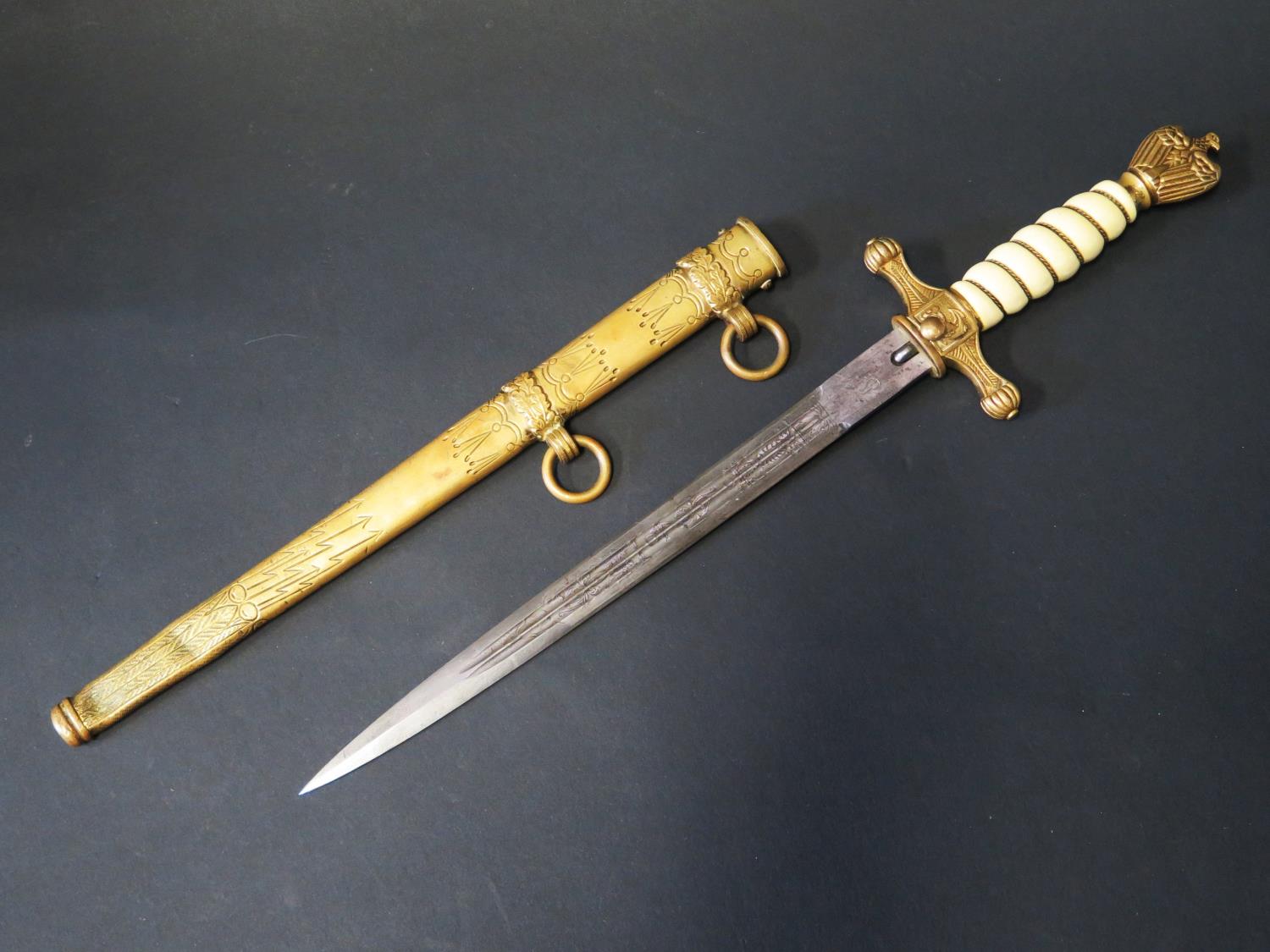 A WWII German Kriegsmarine Dagger stamped with squirel mark ORIGINAL EICKHORN SOLINGEN. Grip cracked - Image 2 of 4