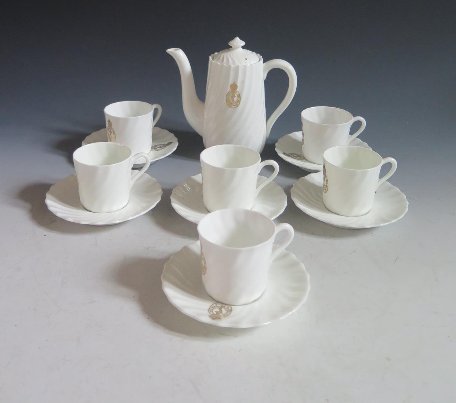 A Royal Navy Coffee Set for Six decorate din gilt with the SIGIL OFFI MAG ADMIR MAG BR &C below