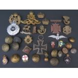 A Collection of Army Cap Badges including The Queens, Iron Cross, buttons etc.
