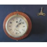 A Ship's Bulkhead Clock with 5" dial, running