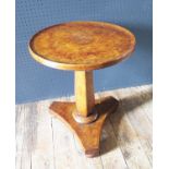 A Victorian Burr Walnut Tilt Top Occasional Table raised on an hexagonal column on a tripod base