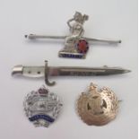 A Silver and Enamel NORFOLK Regiment Brooch, silver gilt Royal Engineers brooch and two others