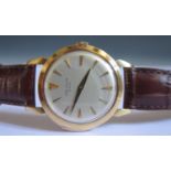 A 18K Gold Cased Minute Repeating Wristwatch. The dial, movement and case marked PATEK PHILIPPE,