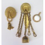 A Gilt Horse Shoe Chatelaine, brooch and pendant