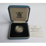 A Royal Mint 1995 Silver Proof One Pound Coin with COA