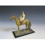 A Cold Painted Spelter Horse with Jockey Table Lighter