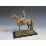 A Cold Painted Spelter Horse with Jockey Table Lighter