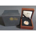A Royal Mint 2009 UK Sovereign Gold Proof Coin no. 5404 with COA