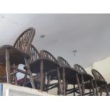 A Set of Six JC Wheel Back Chairs