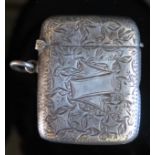 A Victorian Silver Vesta with chased ivy leaf decoration, Birmingham 1897, E V Pledge & Son, 23.4g