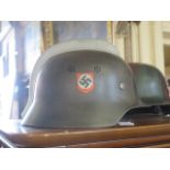 A WWII German 3rd Fireman's Helmet, rim stamped VDNS64