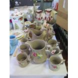 A Victorian Pottery Jug with four mugs, two punch jugs and other ceramics