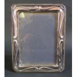 A Modern Silver 7.5" x 5.25" Photograph Frame, London 1984, KF LD