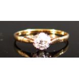An 18ct Gold Diamond Solitaire Ring, size M.5, 1.4g