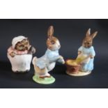 Three Beswick Beatrix Potter Figures: Peter Rabbit, Cecily Parsel and Mrs. Tiggy Winkle