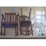 An oak Carver Chair, pair of wheel back chairs and two painted chairs