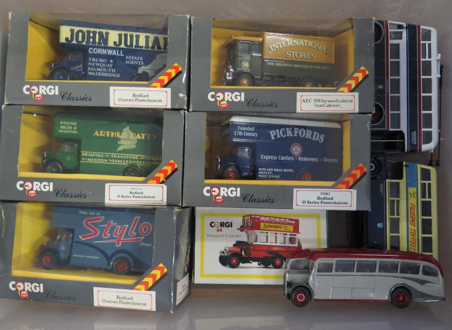 A Collection of Corgi Vans and Buses, some boxed.