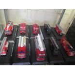 A Collection of Atlas Editions Scale Model Fire Vehicles on Plinths.