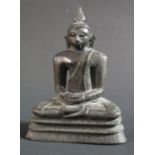 An Indian Bronze Buddha seated in the lotus position, 11.5cm
