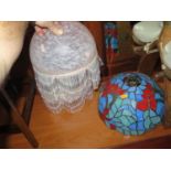 A Pair of Glass Lamp Shades with bead Tassels and one coloured and leaded glass shade