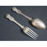 A Victorian Silver Desert Spoon and Fork, the back of the spoon bowl with chased foliate scroll