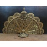 A Brass Peacock Firescreen