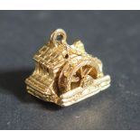 A 9ct Gold Articulated Water Mill Charm, 4.3g