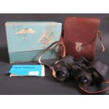 A Pair of Carl Zeiss Jena Jenoptem 8x30W Binoculars with leather case and original box