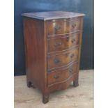 A Burr Walnut Serpentine Chest of Four Drawers