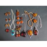 A Collection of Silver Mounted and other Amber Pendants and Earrings , silver necklaces, Israeli