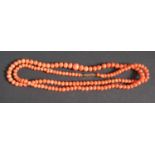 A Coral Bead Necklace with 9ct gold clasp, 12.4g