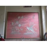 A Large Embroidery depicting birds on pink silk. F & G